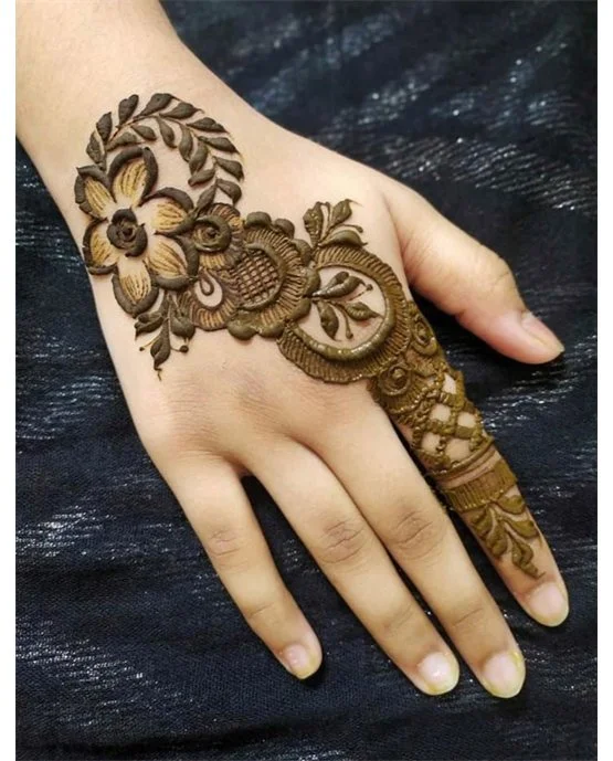 Sleek Orchid With Fusion Along Back Finger Mehndi Design